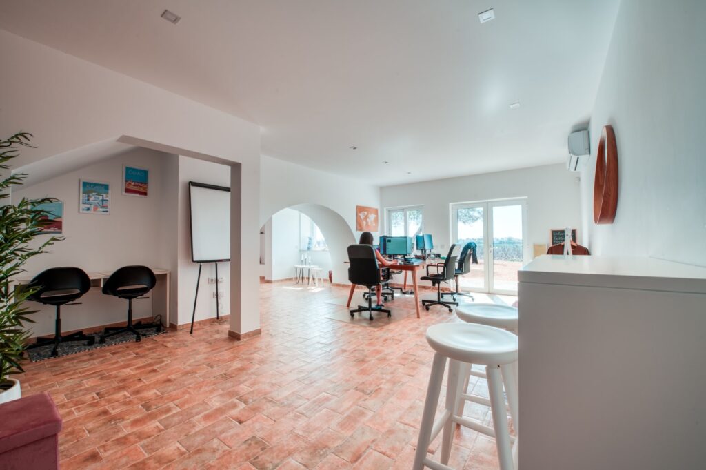 View of coworking of POMAR coliving located in Portugal showing a coliver working