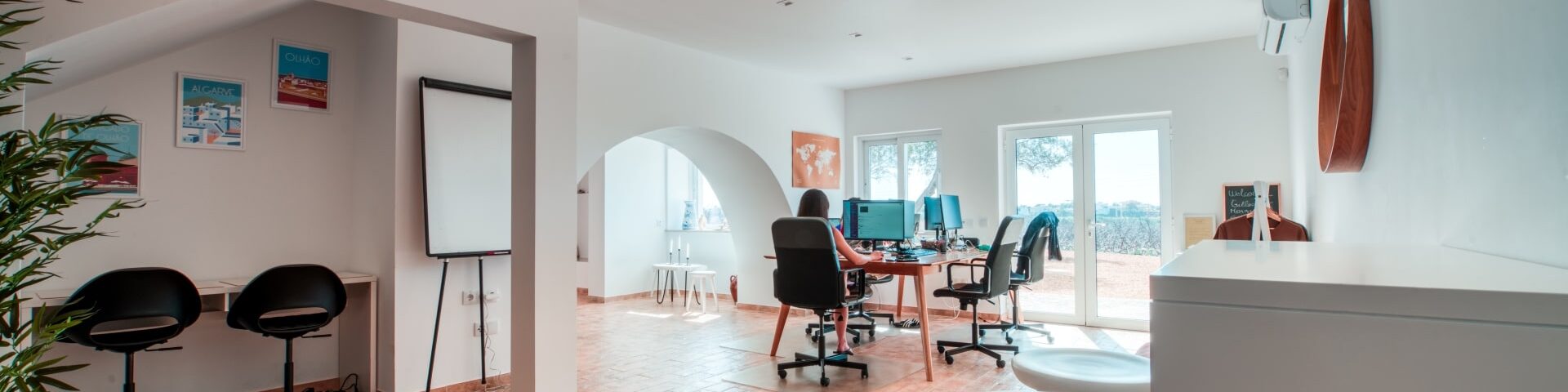 View of coworking of POMAR coliving located in Portugal showing a coliver working